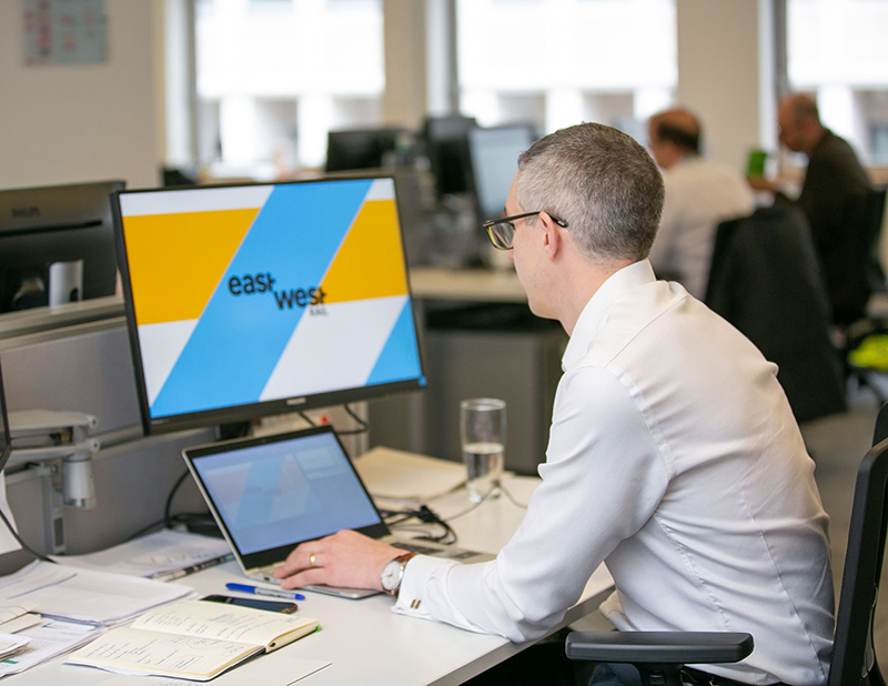 EWr colleague working on computer in office