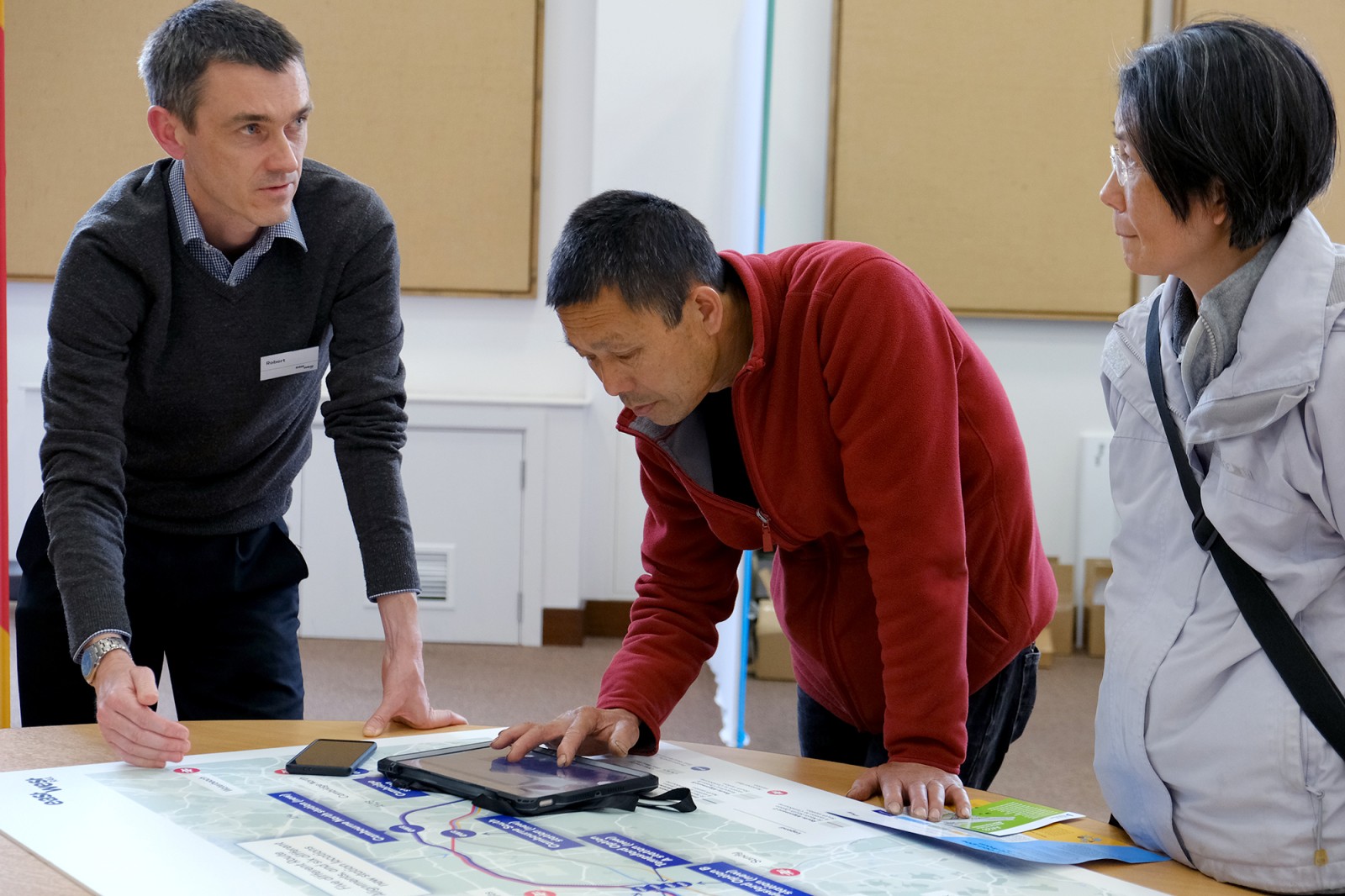 People looking at table