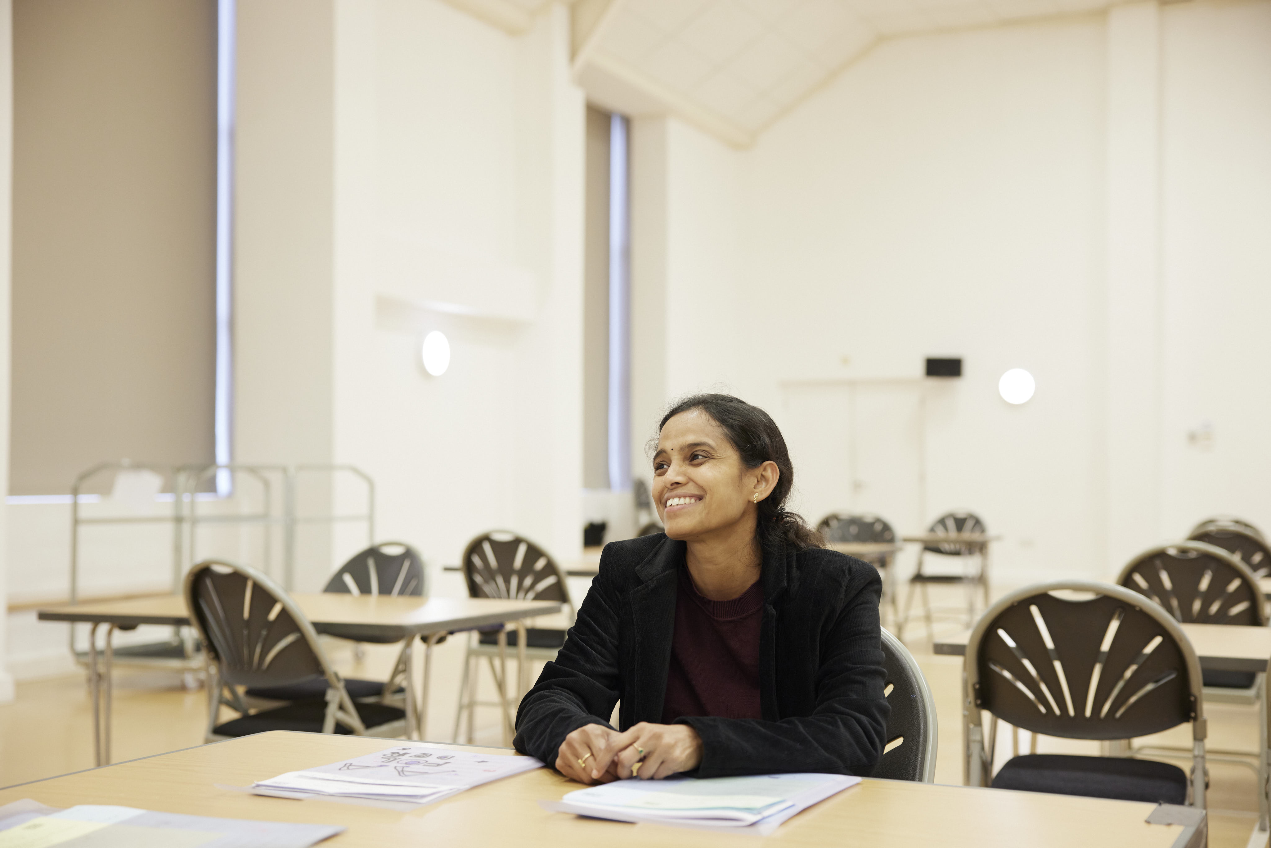 Women-sat-at-table-in-community-hall