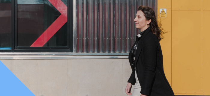 Ellen walking past a window