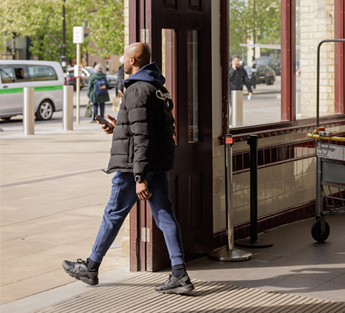Person walking through a station