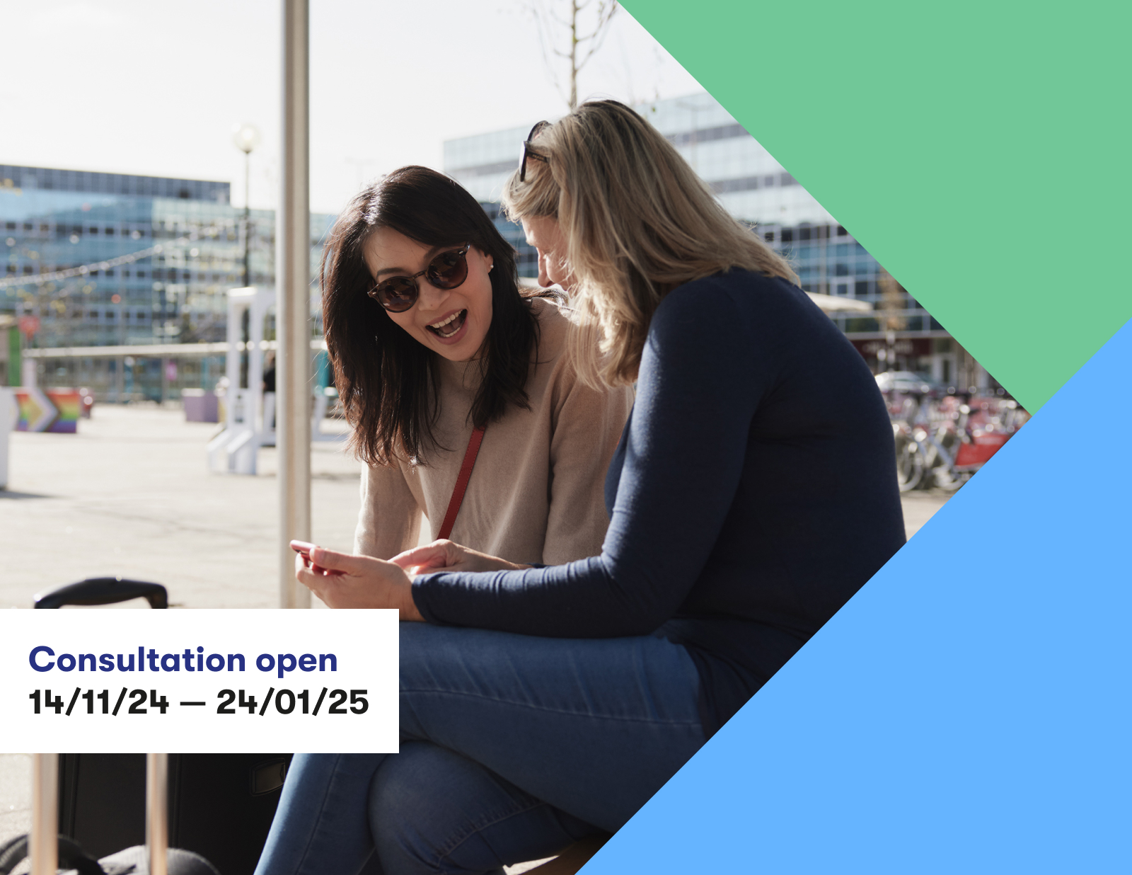 Two women sitting outside MK train station v2